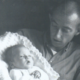 Richard Dunn as a baby, being held by his late father